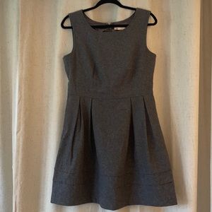 Grey wool jumper. Very flattering.